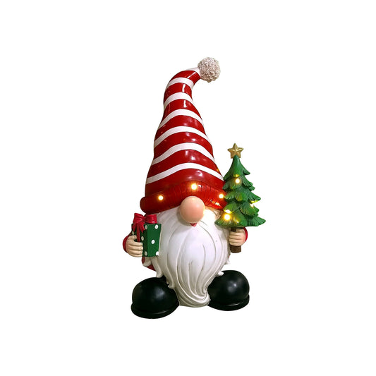 Santa Holding Christmas Tree